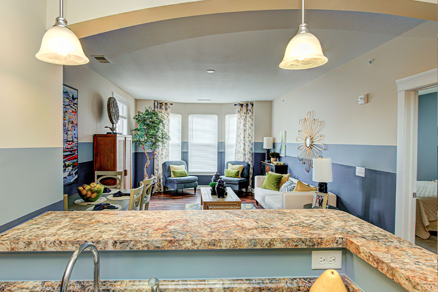 Look for an open living plan, like this one at Union Street Flats. Kitchen and living room view at Union Street Flats Apartments.